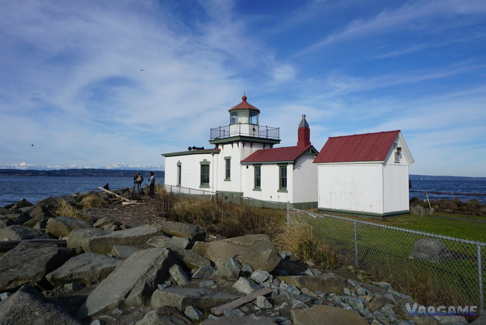 West Point Lighthouse white buildings with red roofs by Puget Sound in Discovery Park Seattle