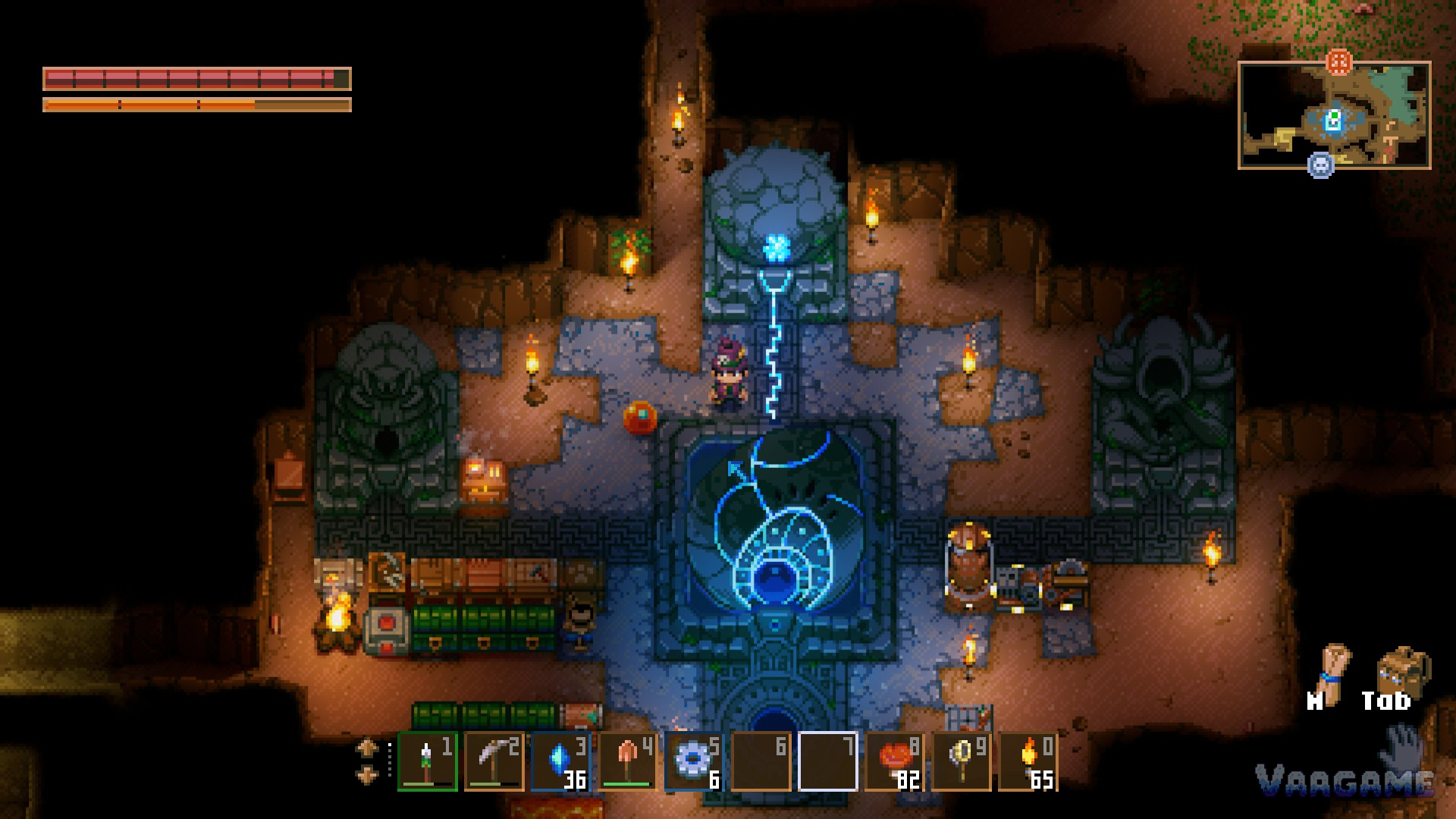 An early Core with a single statue faintly lit, workbench, chests and furnace still rough along the walls