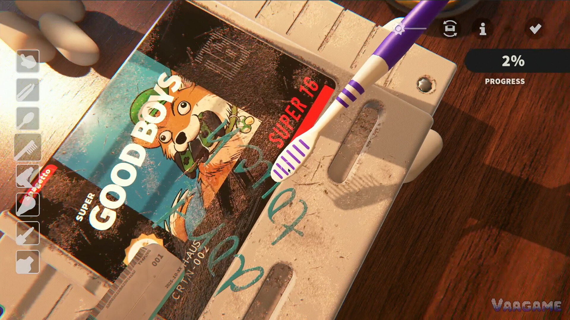 Marker scribbles across a Good Boys label, with a toothbrush working the surface
