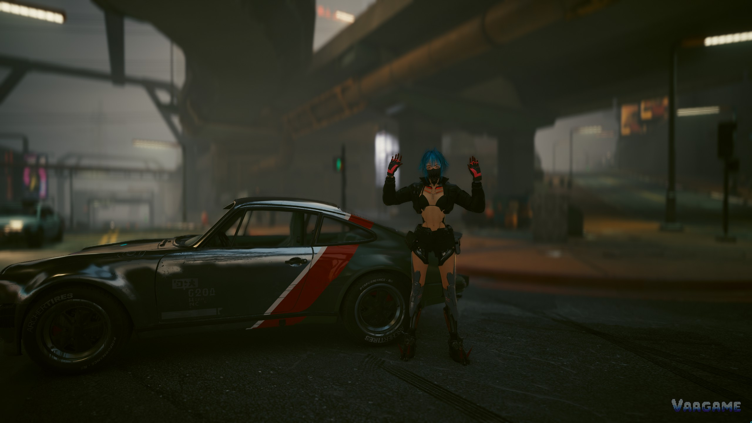 V standing beside a car under a highway in Cyberpunk 2077