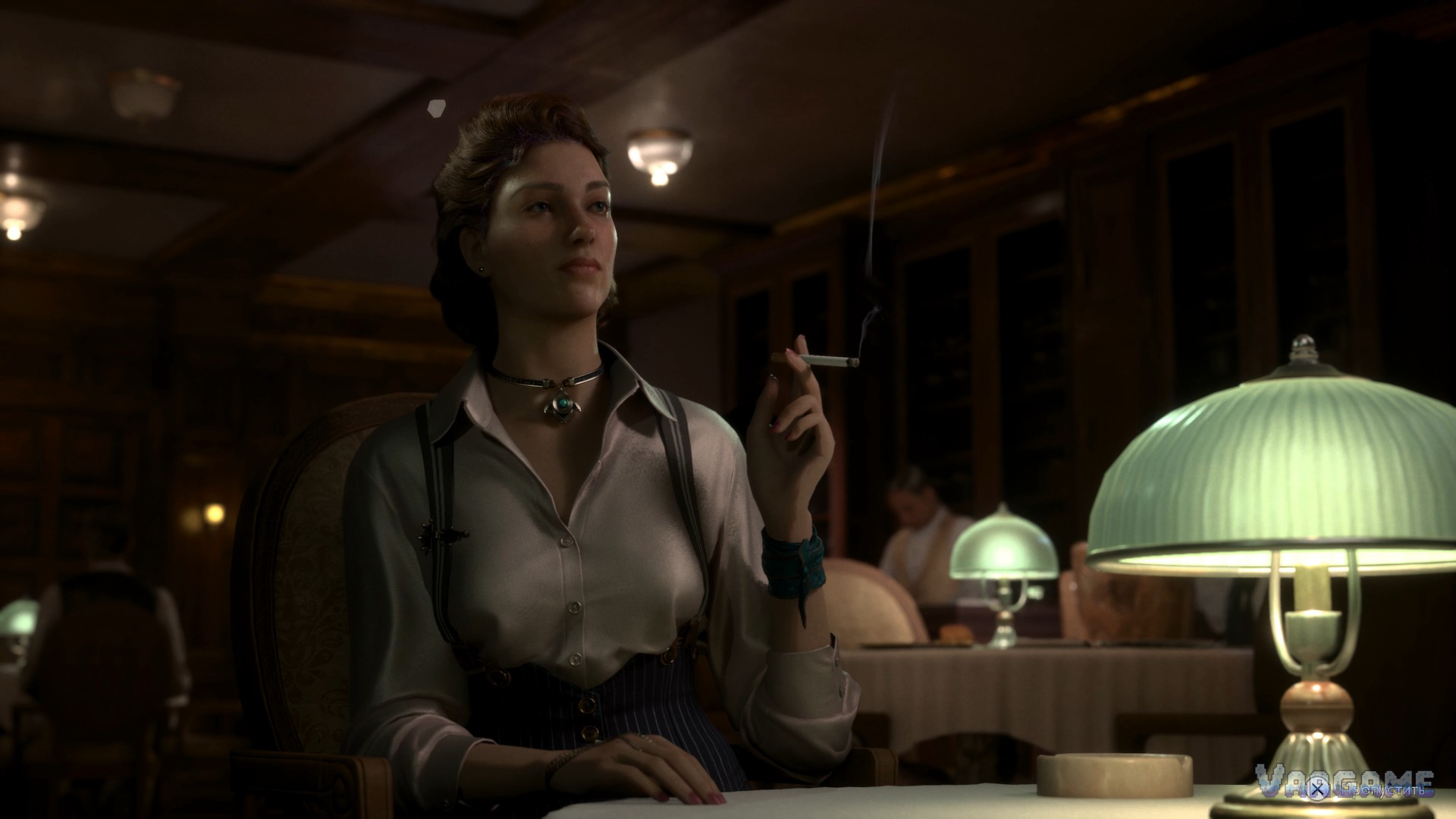 A woman at a table with a lamp
