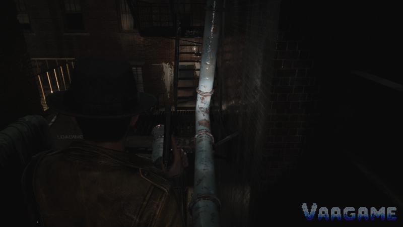 Cross the blue pipes toward the Printing House.