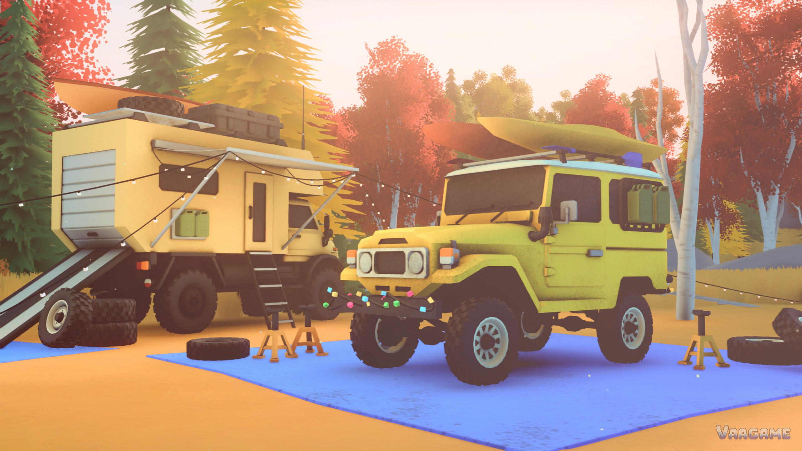 A yellow wagon up on jack stands at a mechanic stop, expedition camper truck alongside