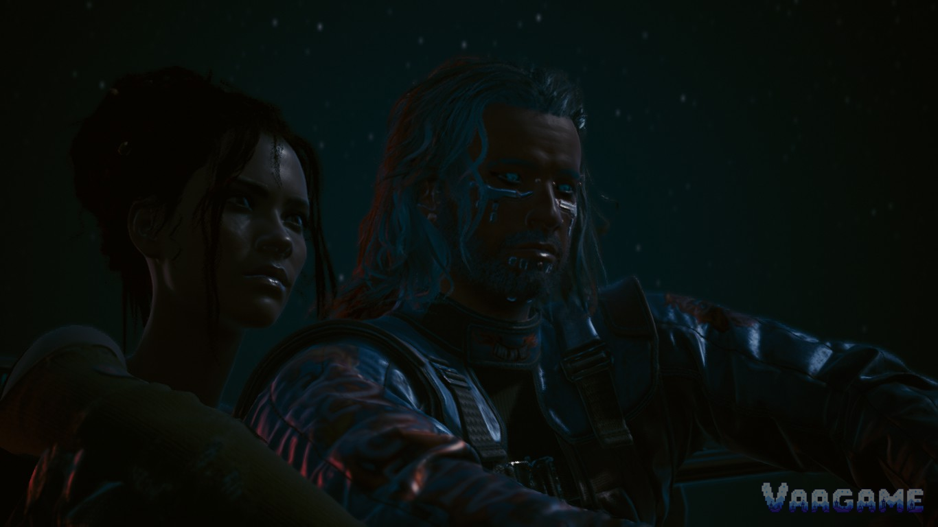 V and a companion driving at night in Cyberpunk 2077