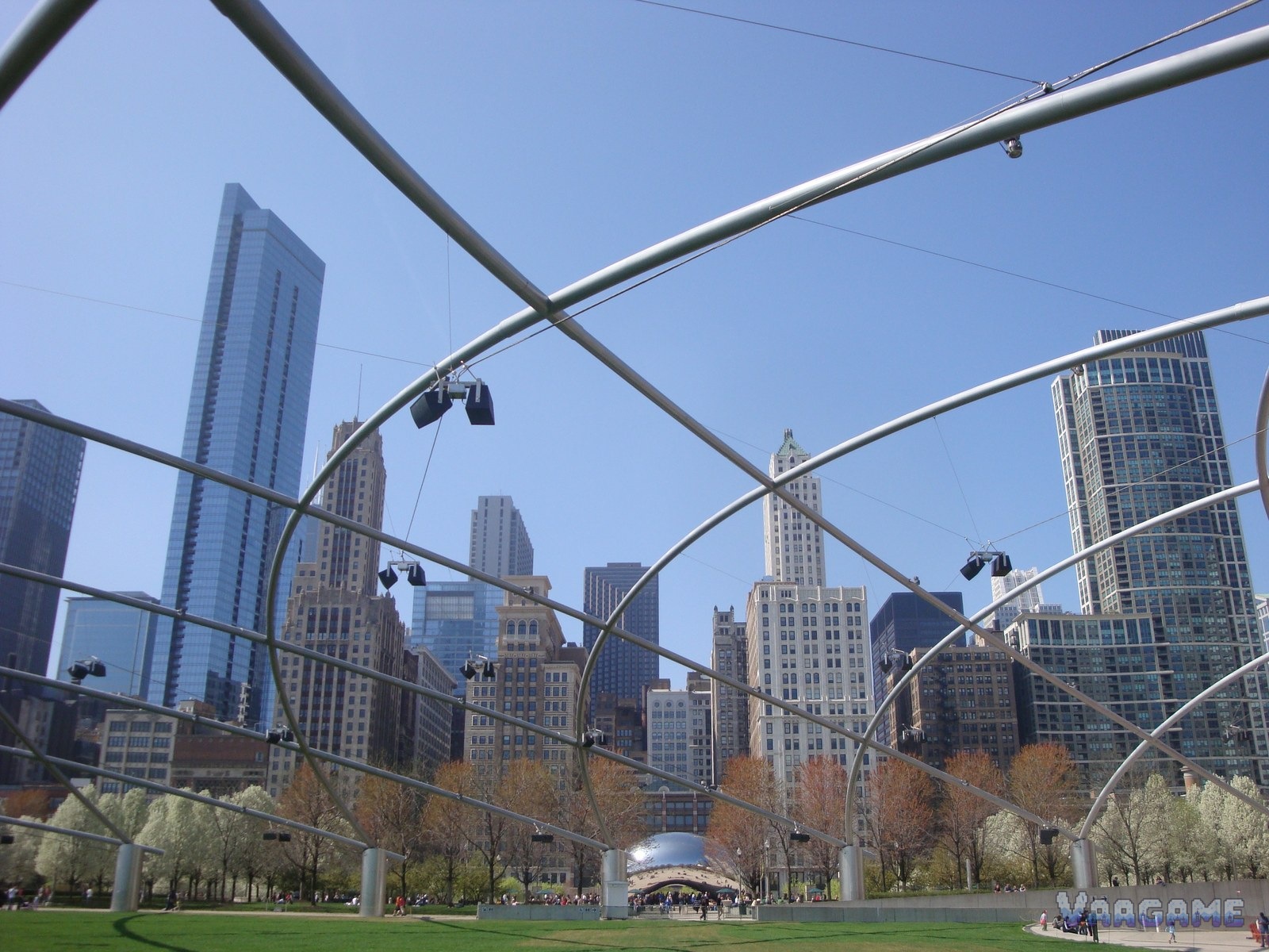 Pritzker Pavilion steel trellis over the lawn in Millennium Park Chicago