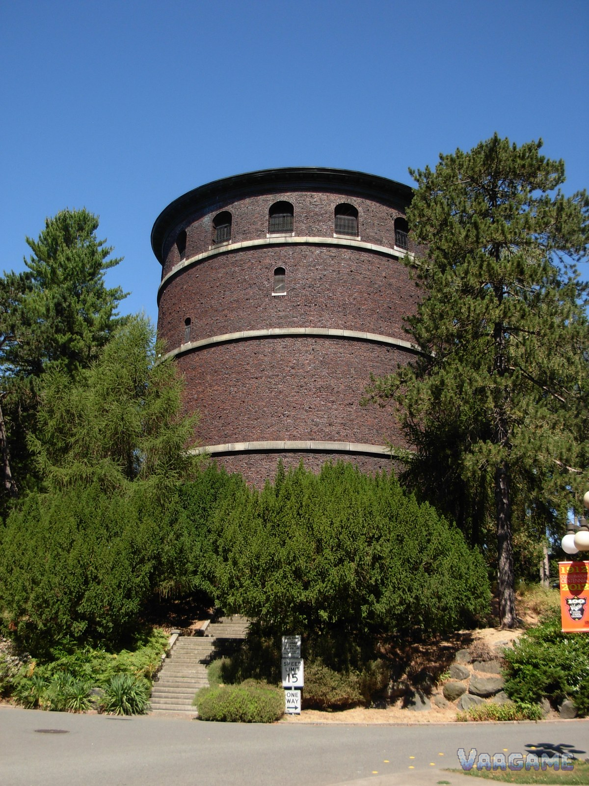 Volunteer Park brick water tower with pine trees in Seattle
