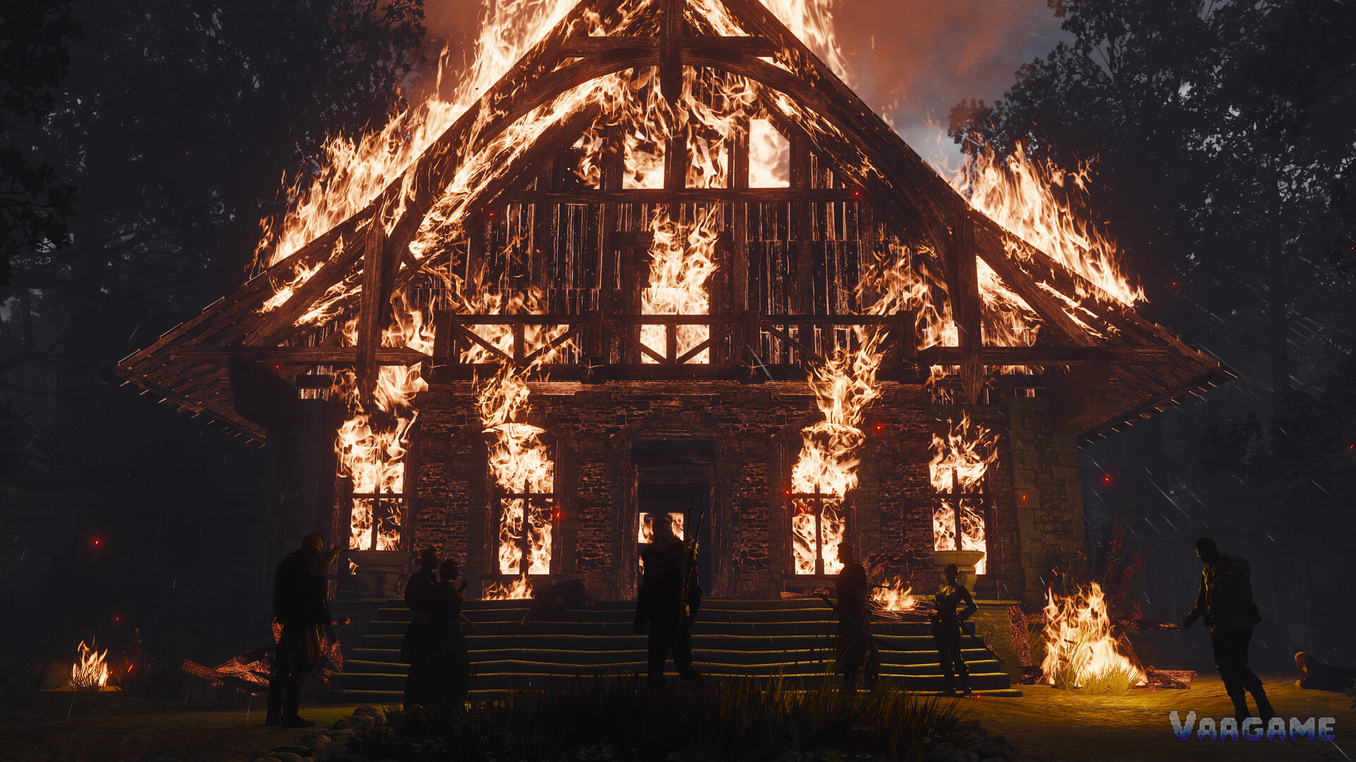 A timber house ablaze in the rain, villagers silhouetted in front of it