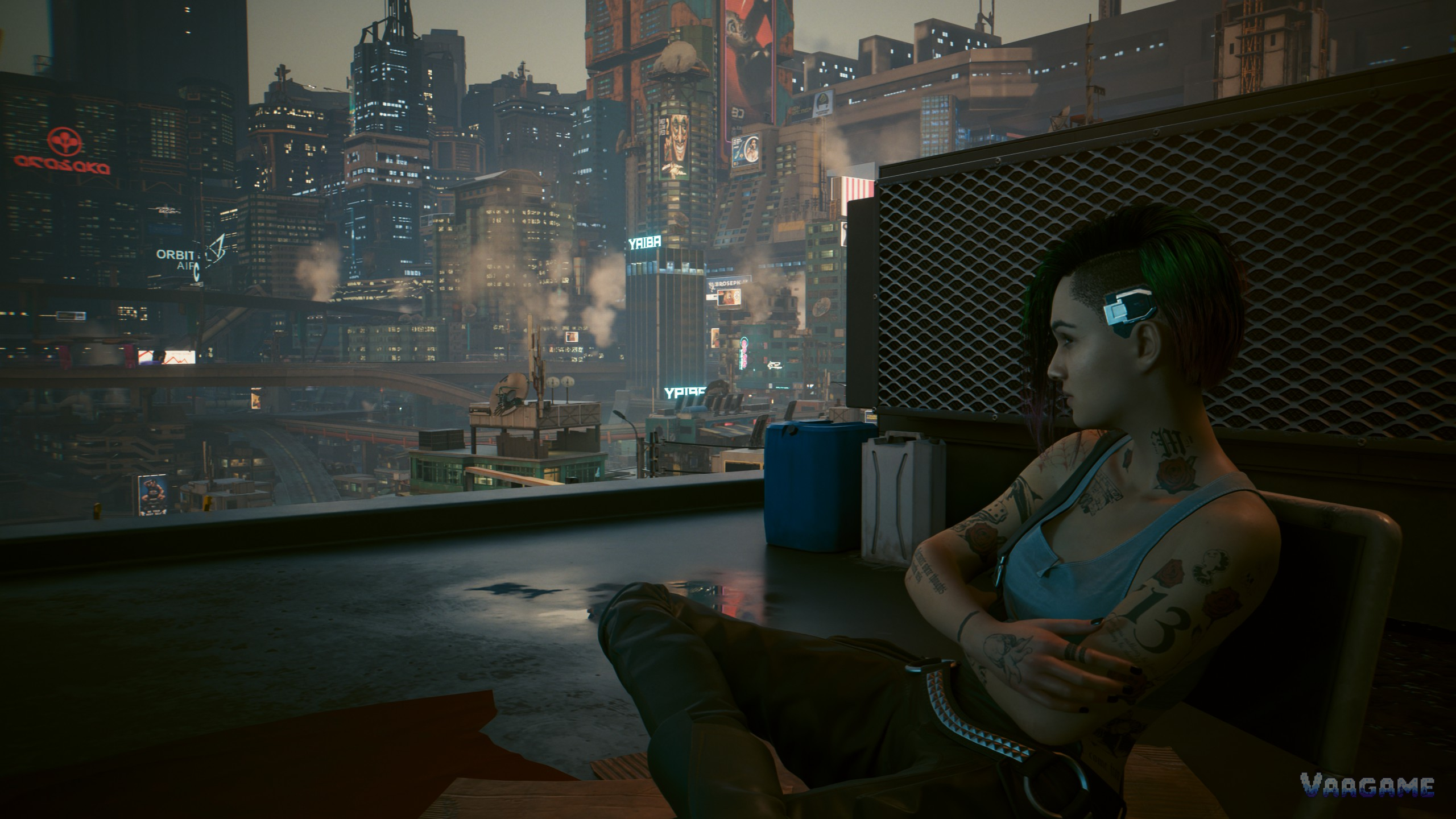 V sitting on a rooftop overlooking Night City in Cyberpunk 2077