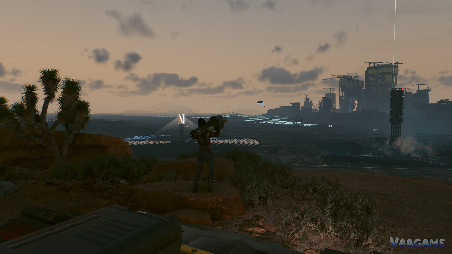 V overlooking Night City from the Badlands at dusk in Cyberpunk 2077