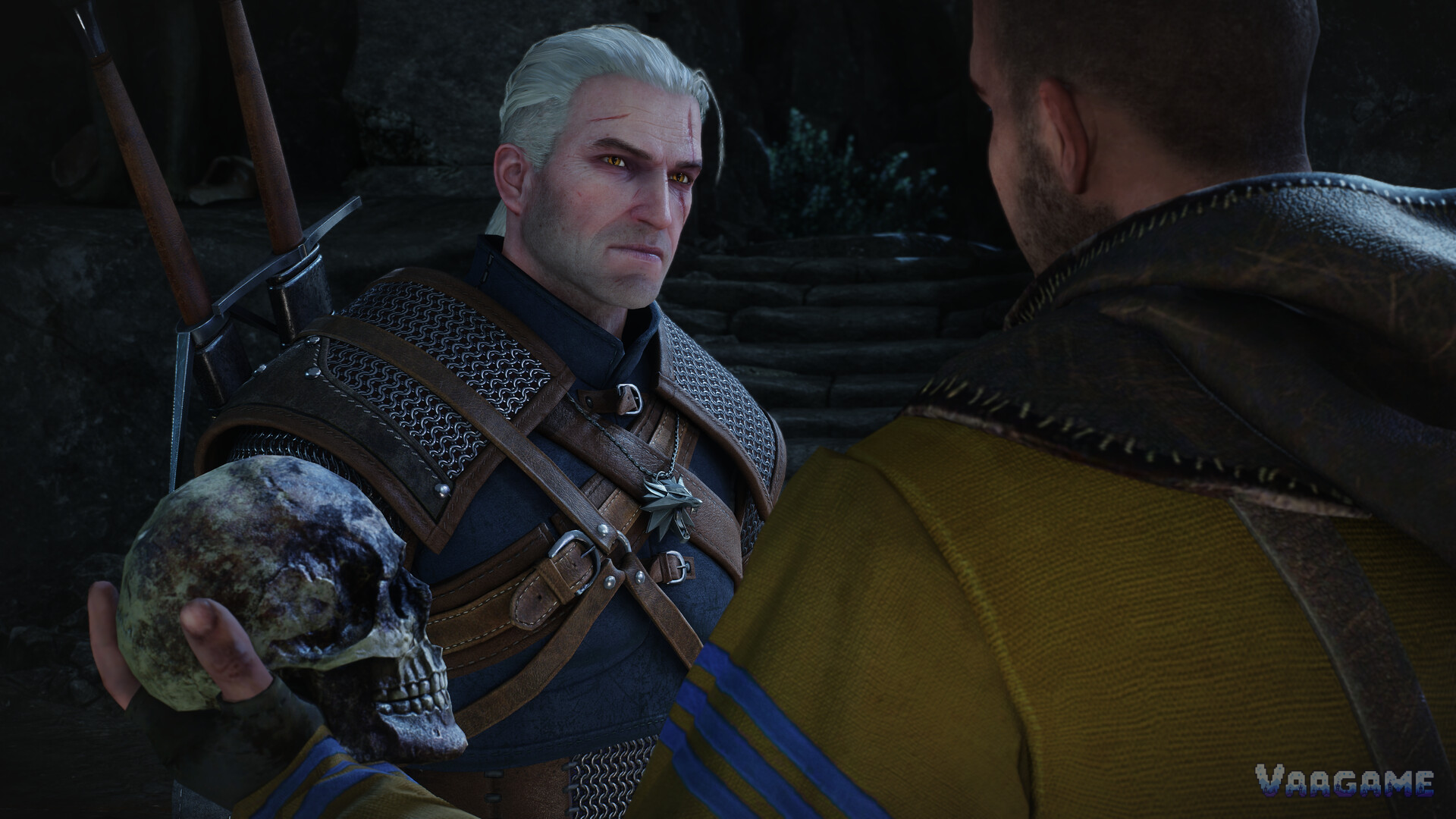 A conversation close-up: a man holds up a skull while he talks to Geralt