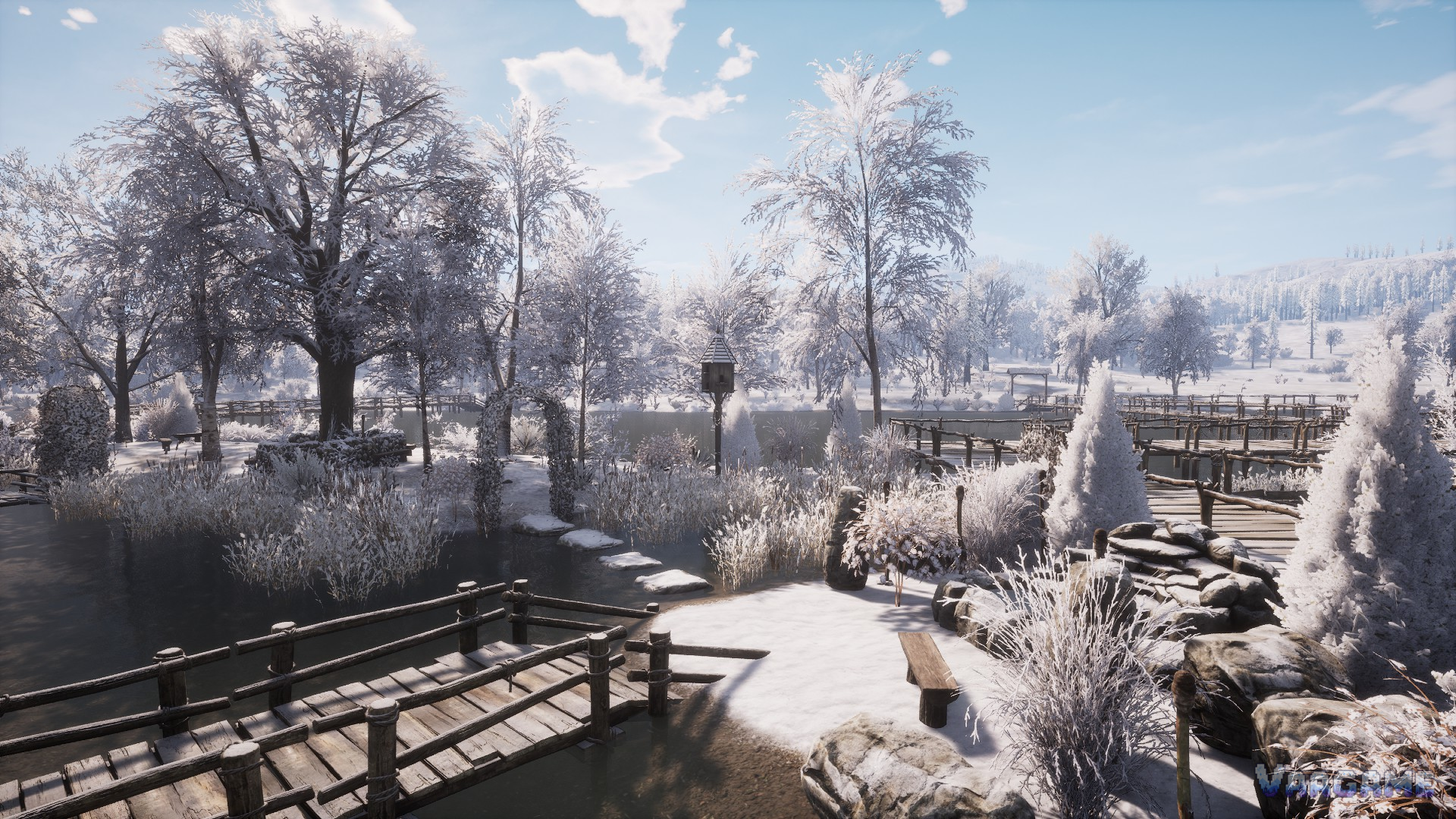 Snowy village garden by frozen water with a bridge
