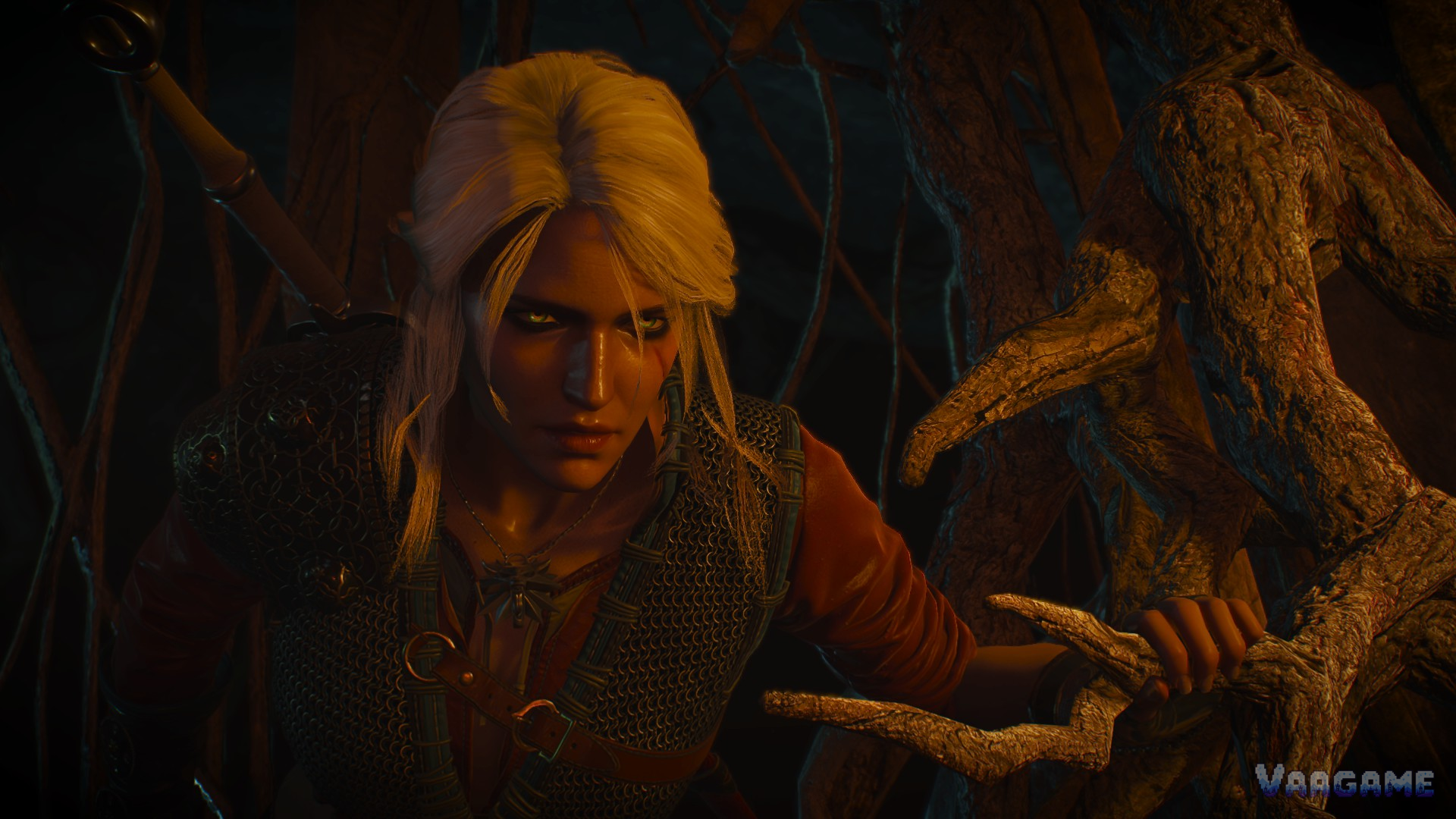 Geralt in torchlight, hair and beard lit by warm firelight