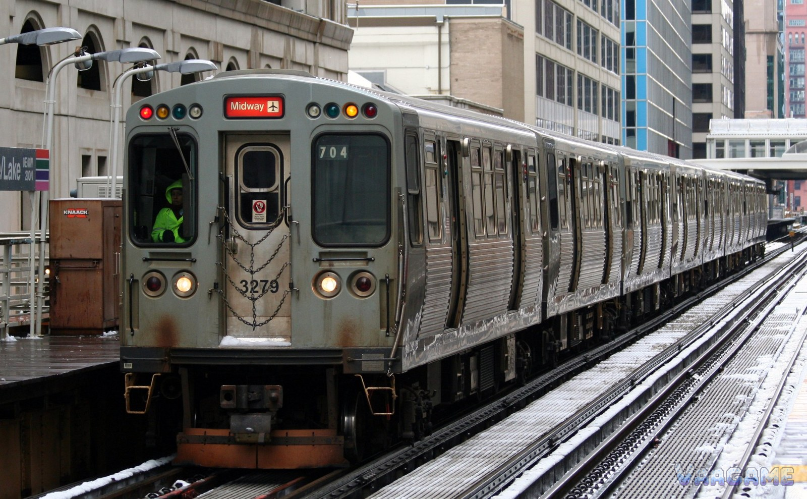 CTA Orange Line train on elevated tracks in the Chicago Loop in winter