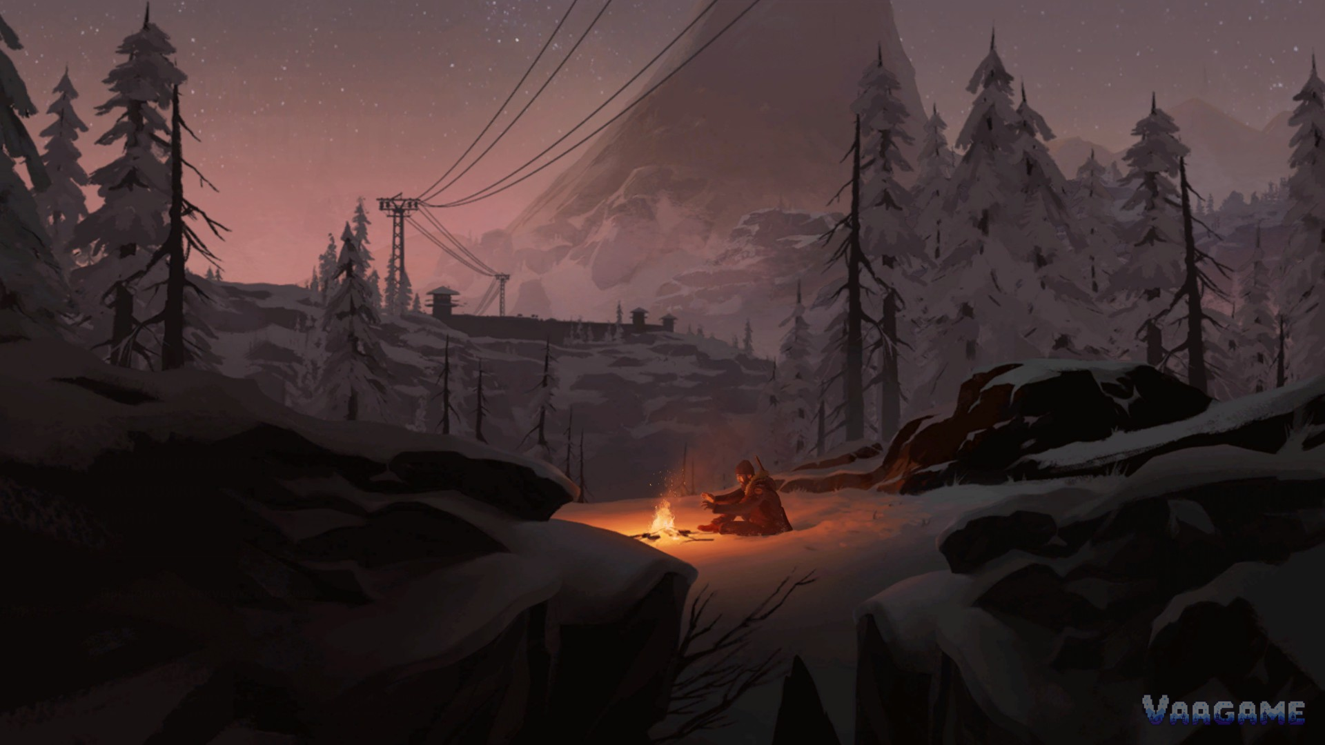 Campfire under power lines at dusk