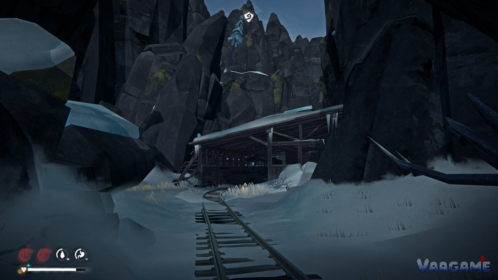 Snowy railway yard with tracks leading to a shelter