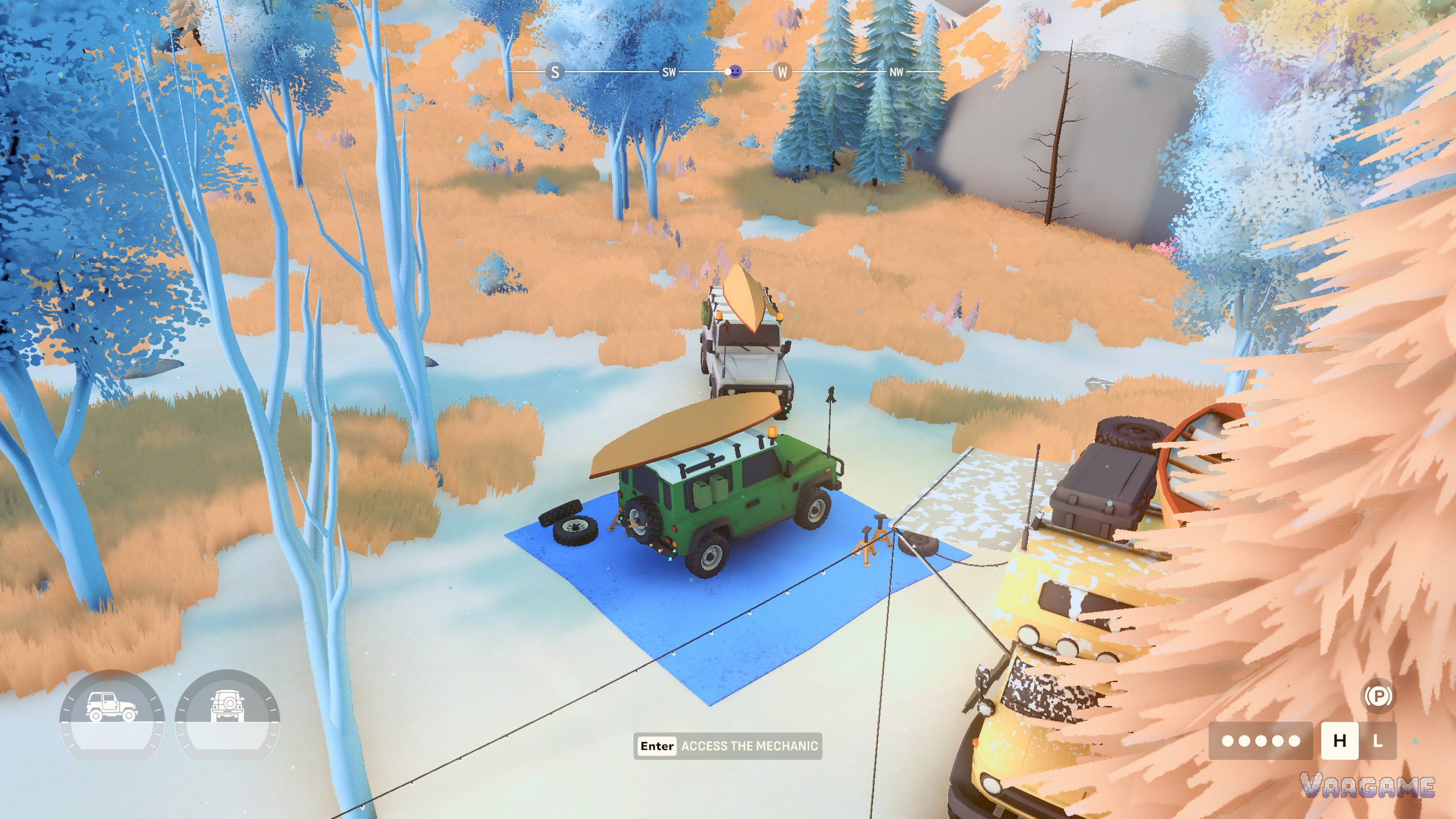 A top-down view of a truck on a mechanic work mat with a wheel off and kit laid out