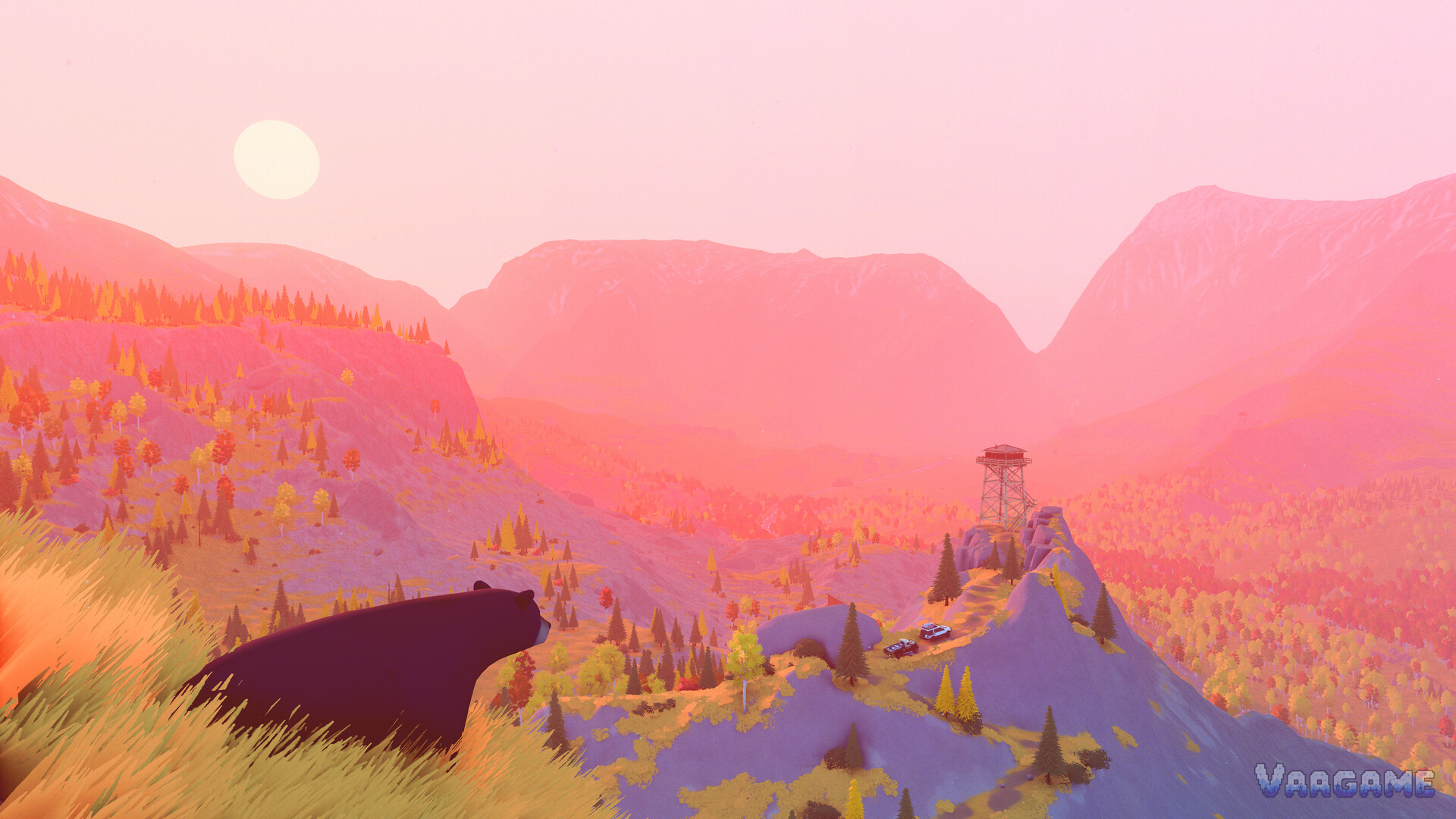 A pink-hour mountain valley with a watchtower on the ridge and a black bear in the foreground grass