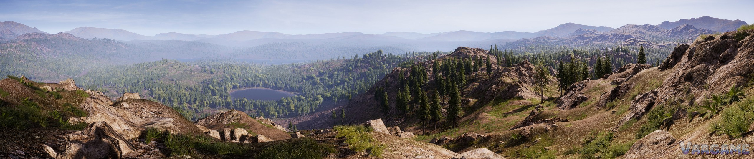 Mountain valley panorama with a lake